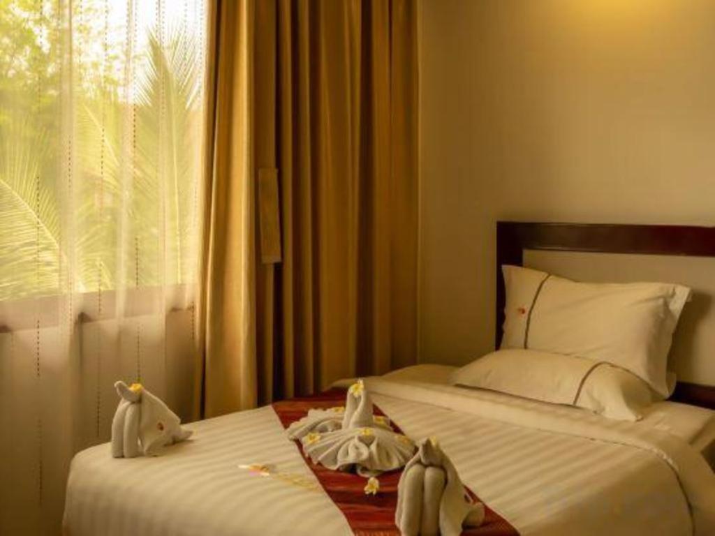 Xishuangbanna Hotel Managed By Xandria Hotel Luang Prabang Zewnętrze zdjęcie